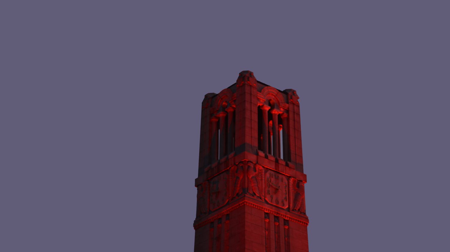 red belltower at dawn