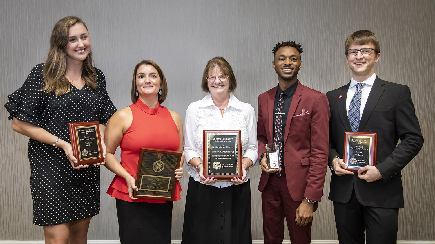 Natalie Truby, Student Excellence Award; Maggie LaPlante, Zenith Medal for Service; Nancy Ridenhour, Distinguished Alumnus Award; Jamal Moss, Outstanding Young Alumnus Award; and Grant Barkley, Student Excellence Award