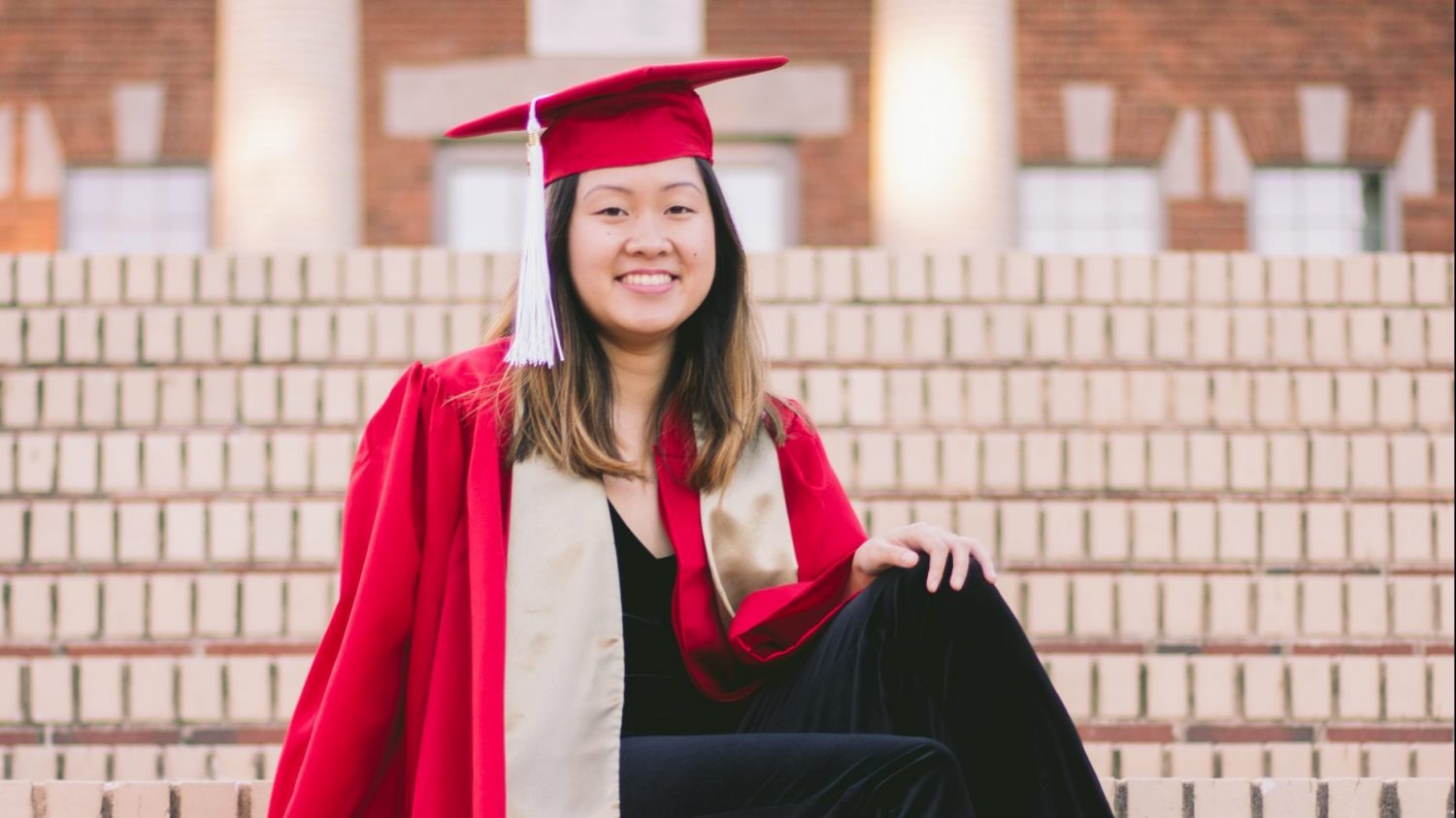 Jasmine Wang in graduation cap and gown