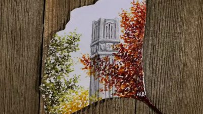 belltower painted on the back of a leaf