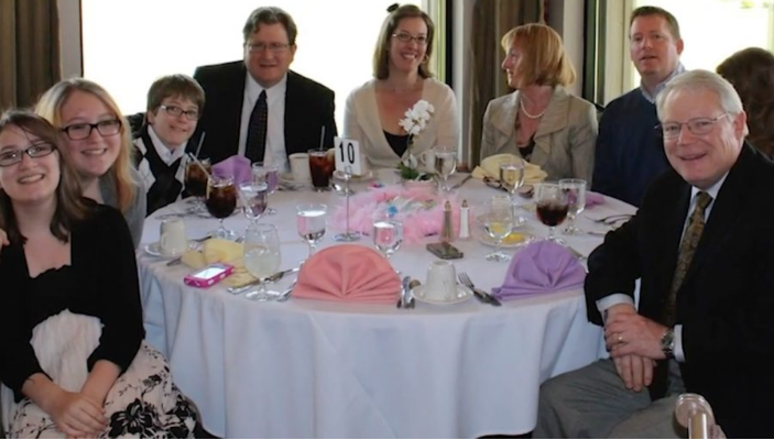 Culberson family gathered around a table at an event