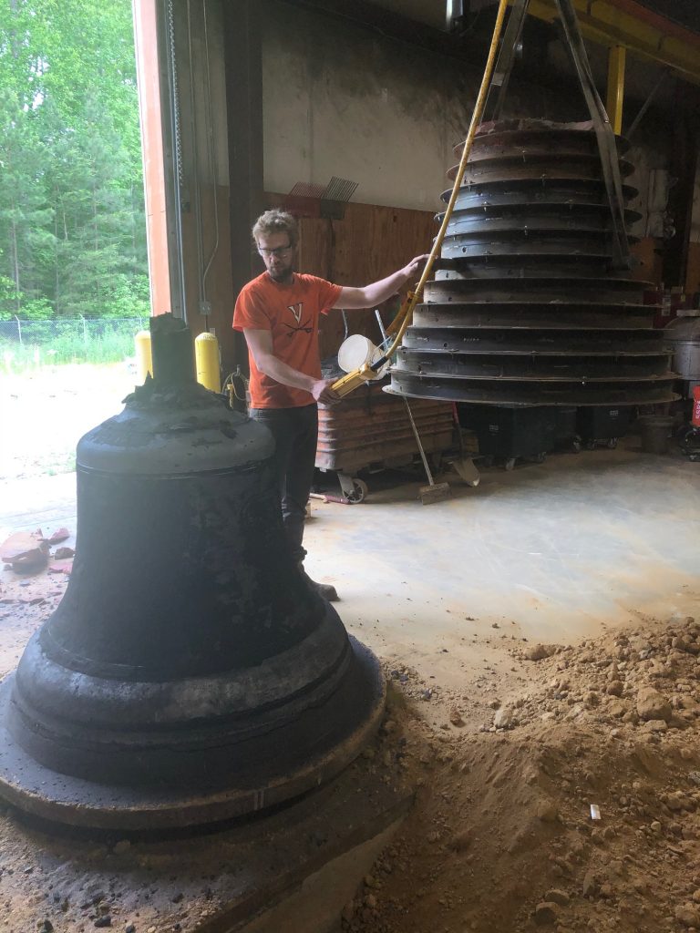 Ben Sunderlin working on the largest bell in the carillon