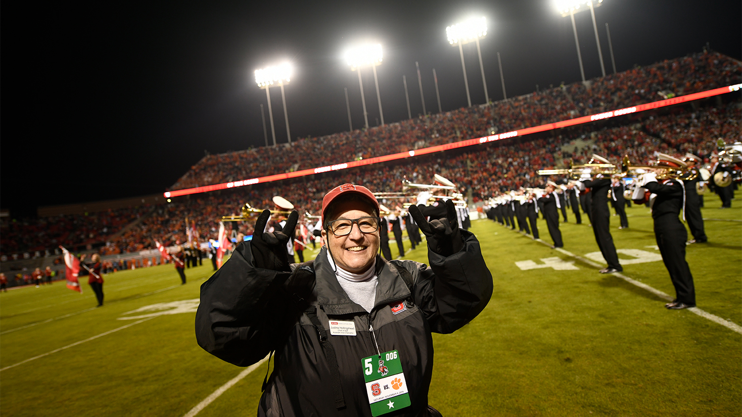Justine Hollingshead on the field at an NC State football game