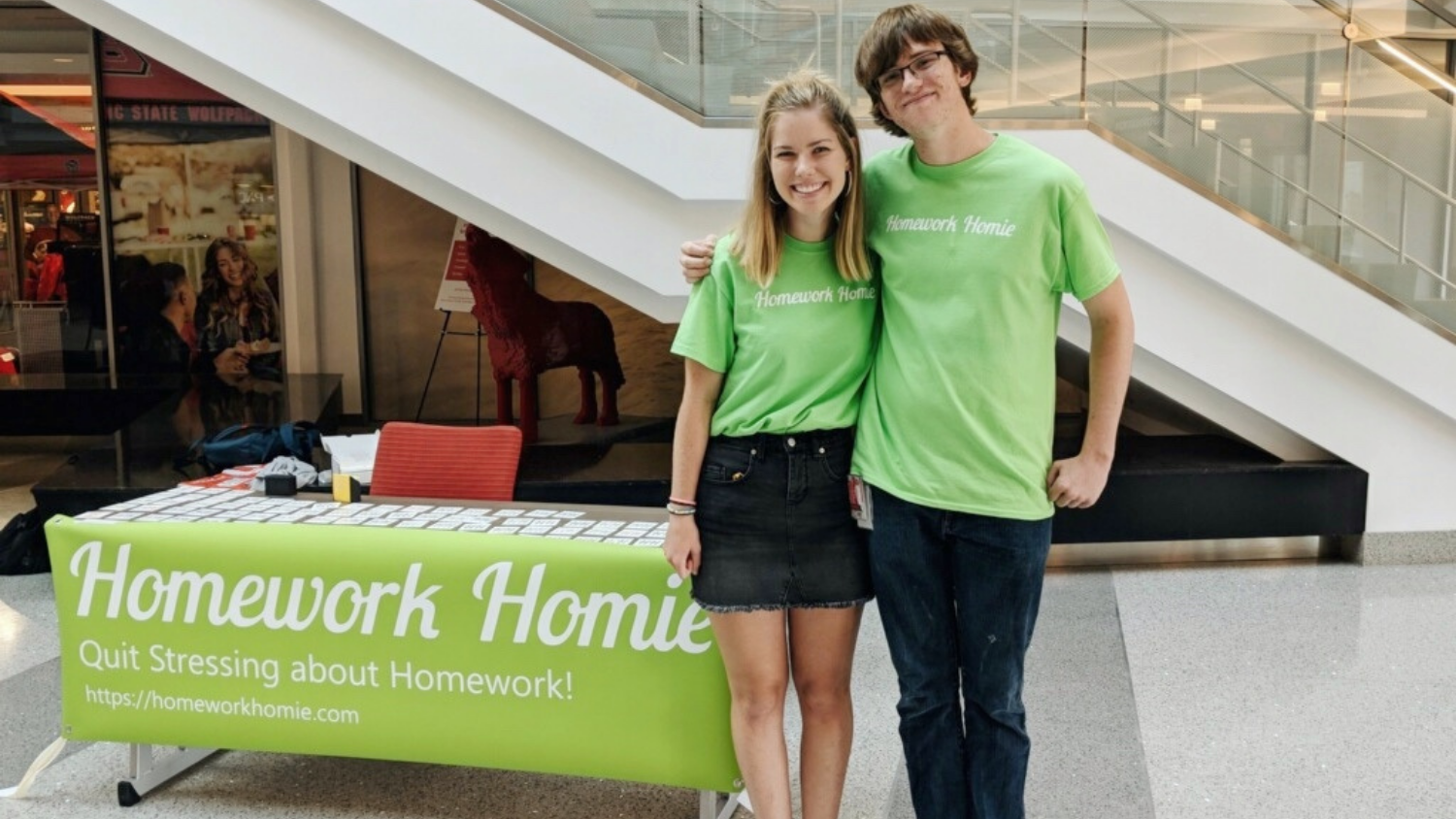 Sam Weaver and co-founder Meg Grant promoting Homework Homie at Talley Student Union