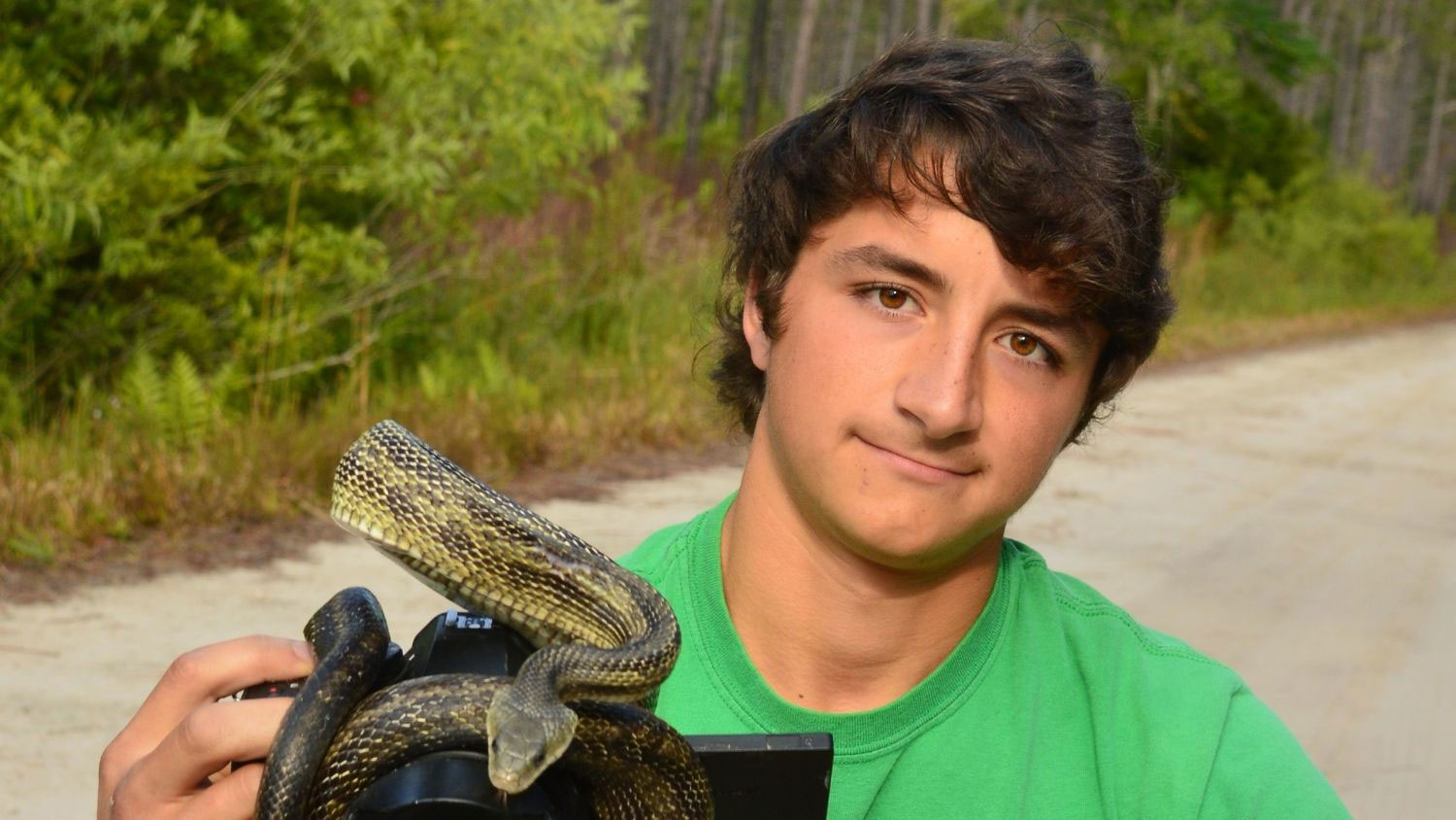 Ben Zino with a snake