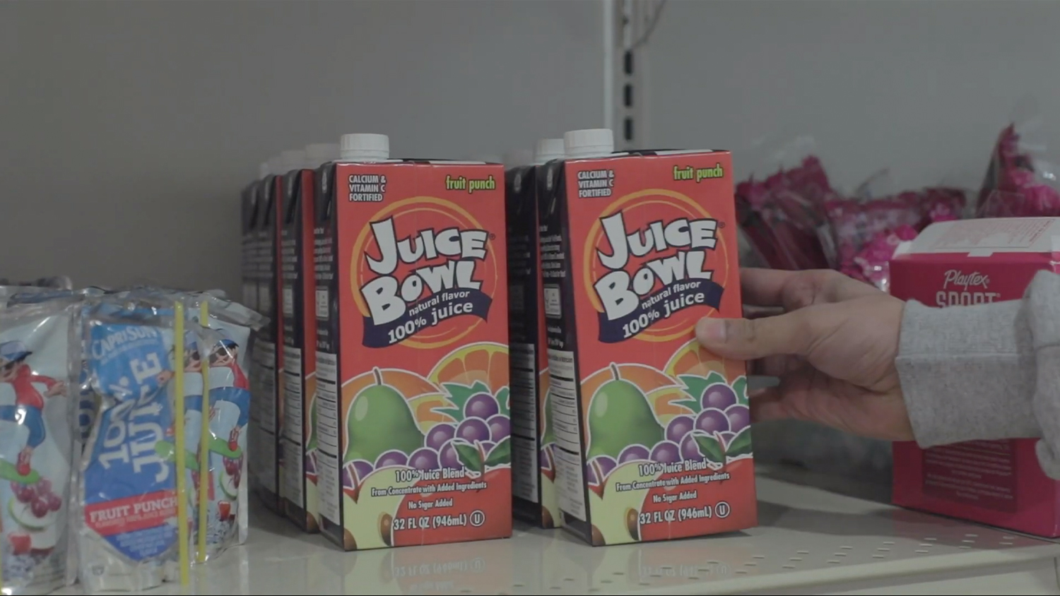 Juice boxes on the shelves of Feed the Pack Food Pantry