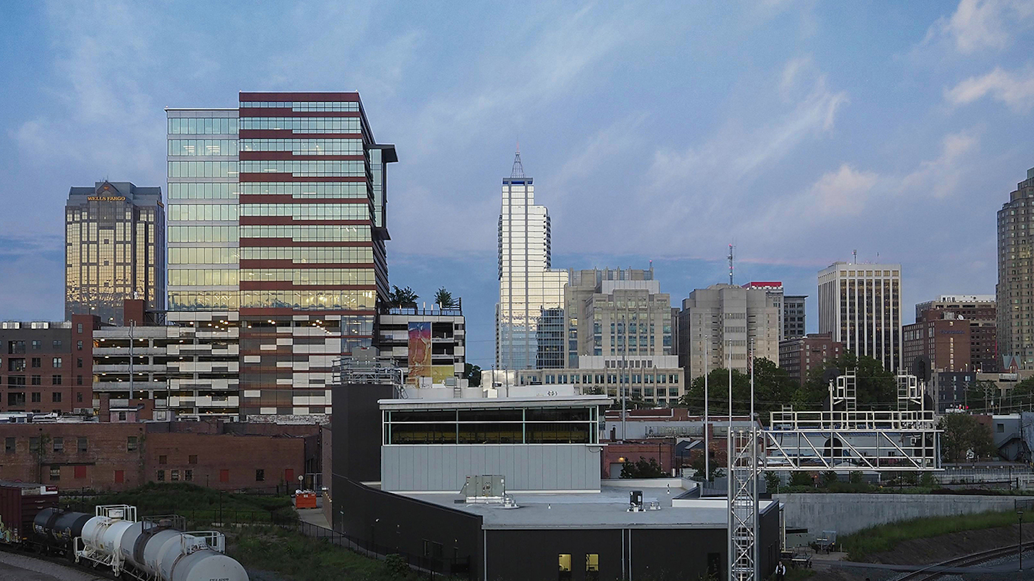The downtown Raleigh skyline at dusk, as seen from the Boylan street bridge.