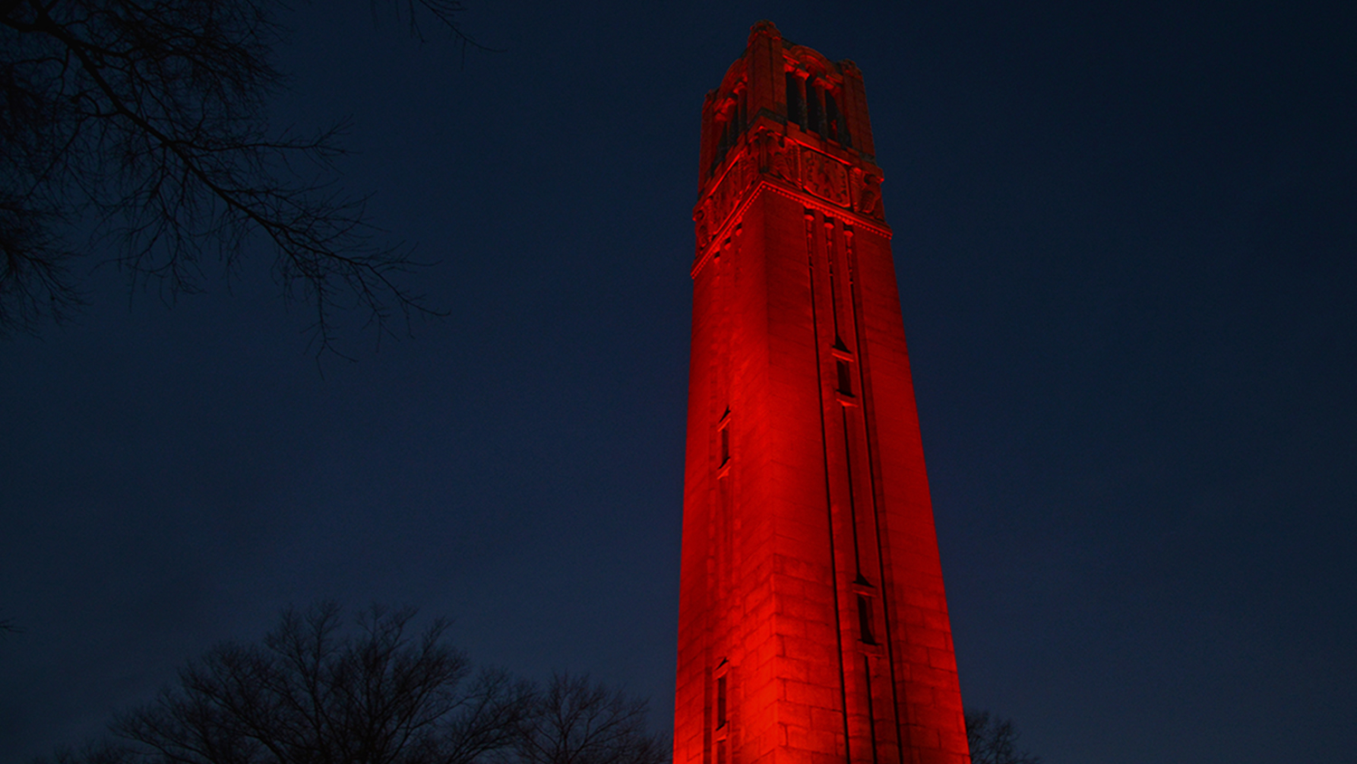 The belltower lit red