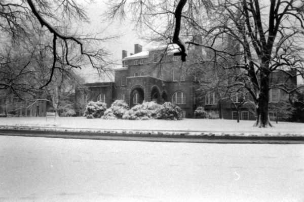 black and white photo of Holladay Hall in the snow