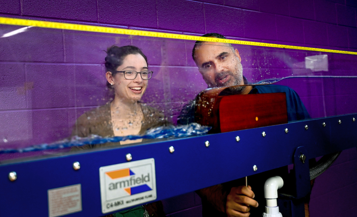 Assitant Professor Tarek Aziz works with a student in the Hydraulics Lab 
