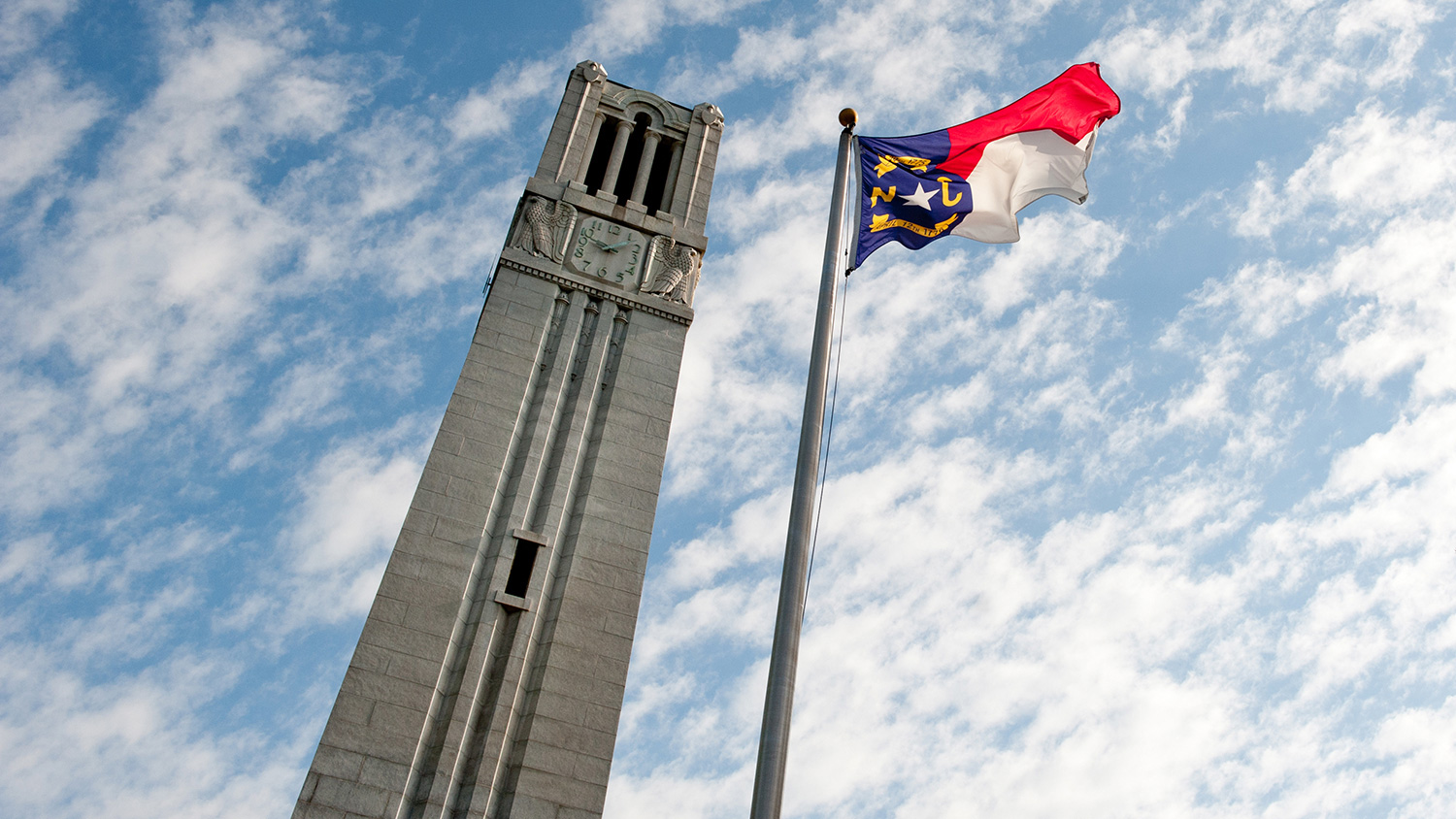 The NC state flag and the Memorial Belltower