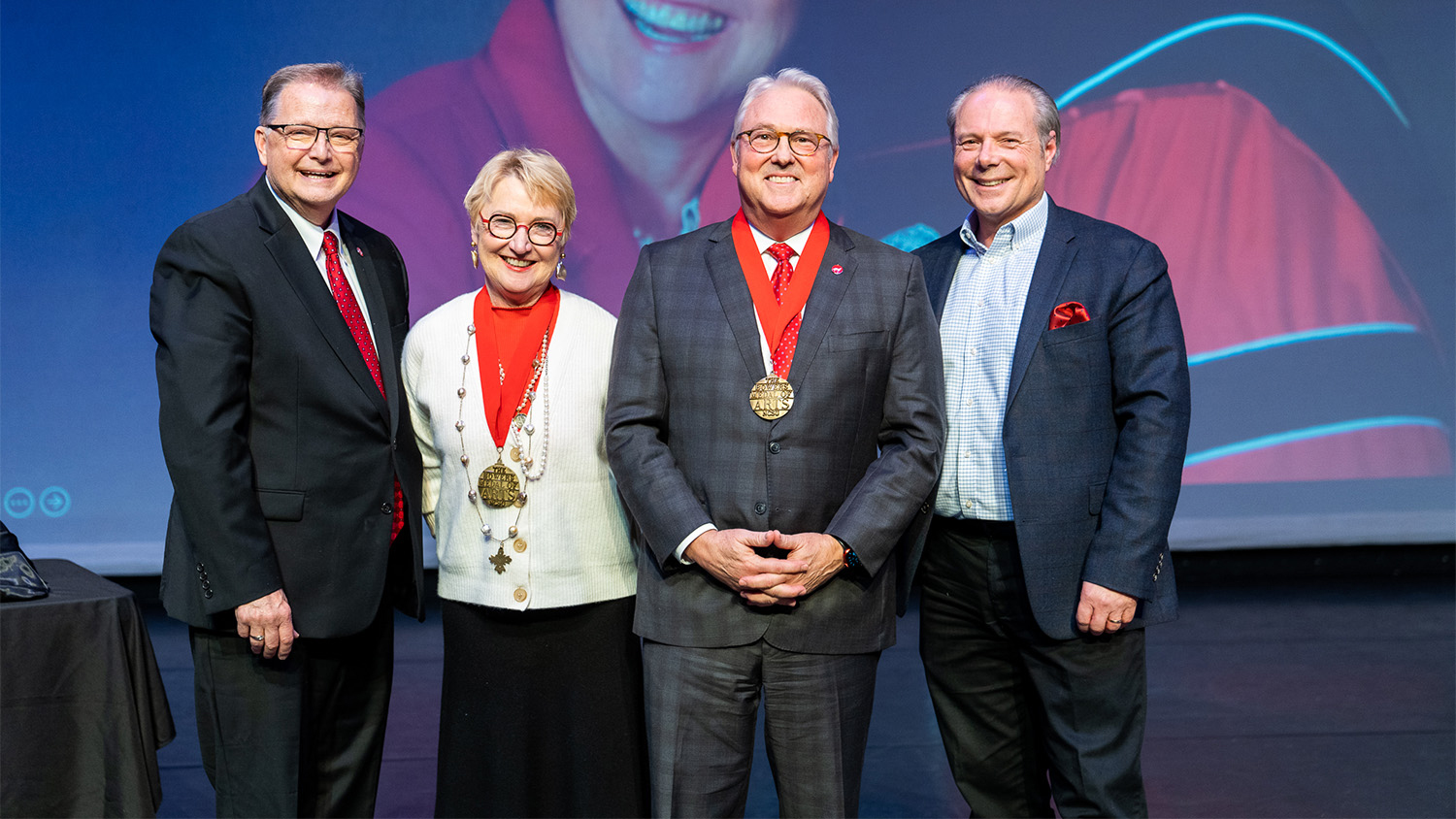(From left) Dan Cook, chair of the Friends of Arts NC State Board; Susan Woodson; Randy Woodson, Chancellor of NC State; and Rich Holly, associate dean of University College and executive director for the arts.