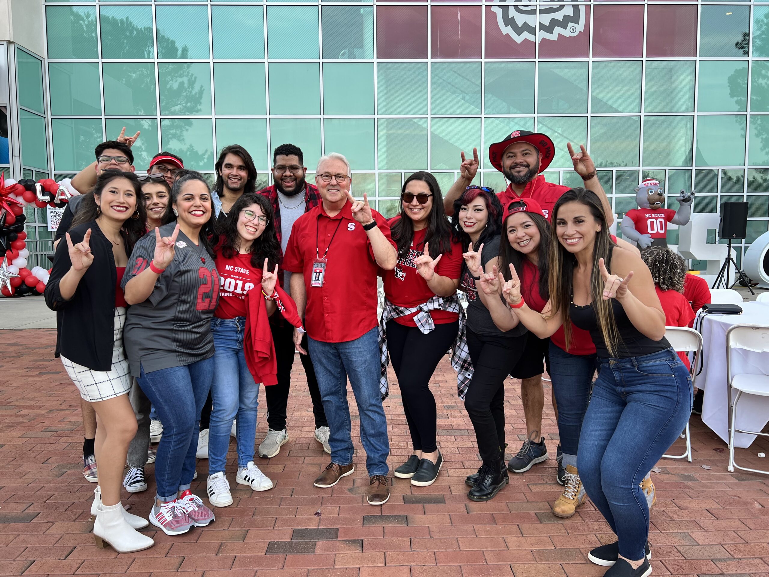 The Chancellor posing with LAN members outside of Carter-Finley.
