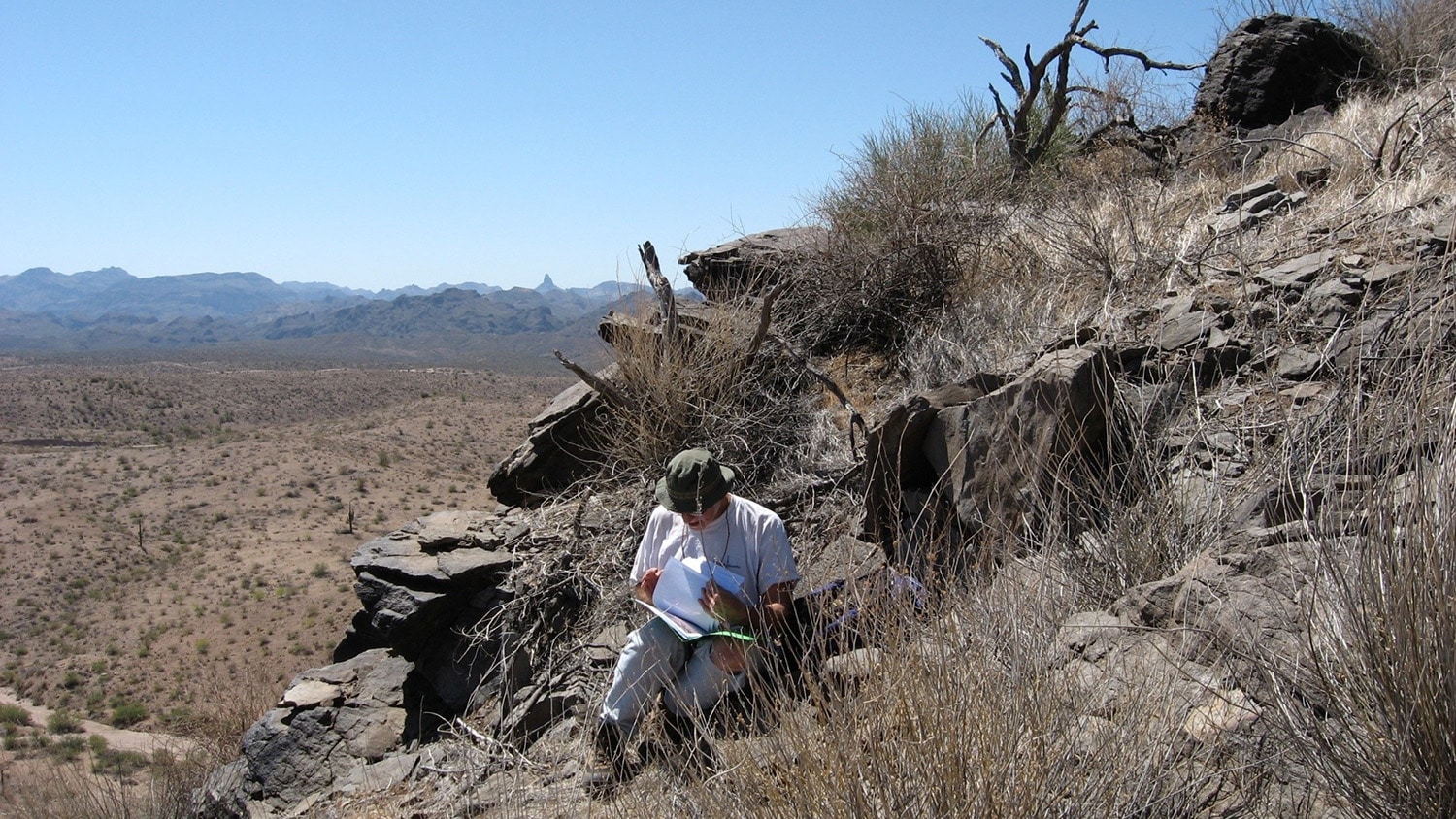 The late Ron Fodor, a former professor of geology, does field work in 2008.