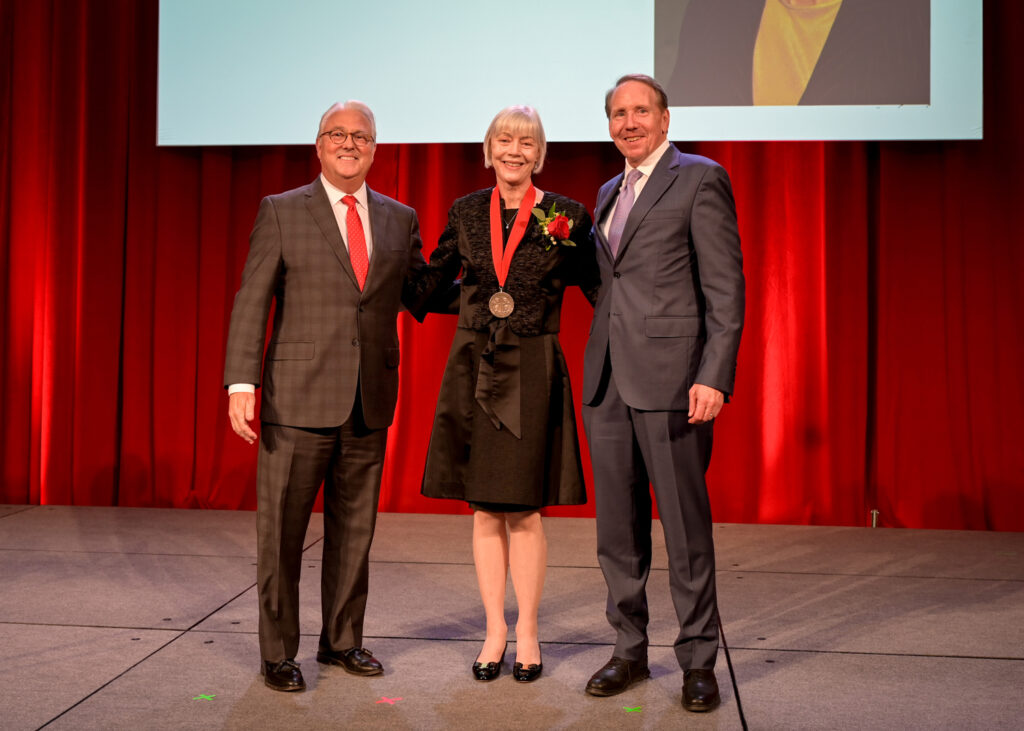 From left: Chancellor Randy Woodson, Cathy Sigal and Ed Weisiger Jr.