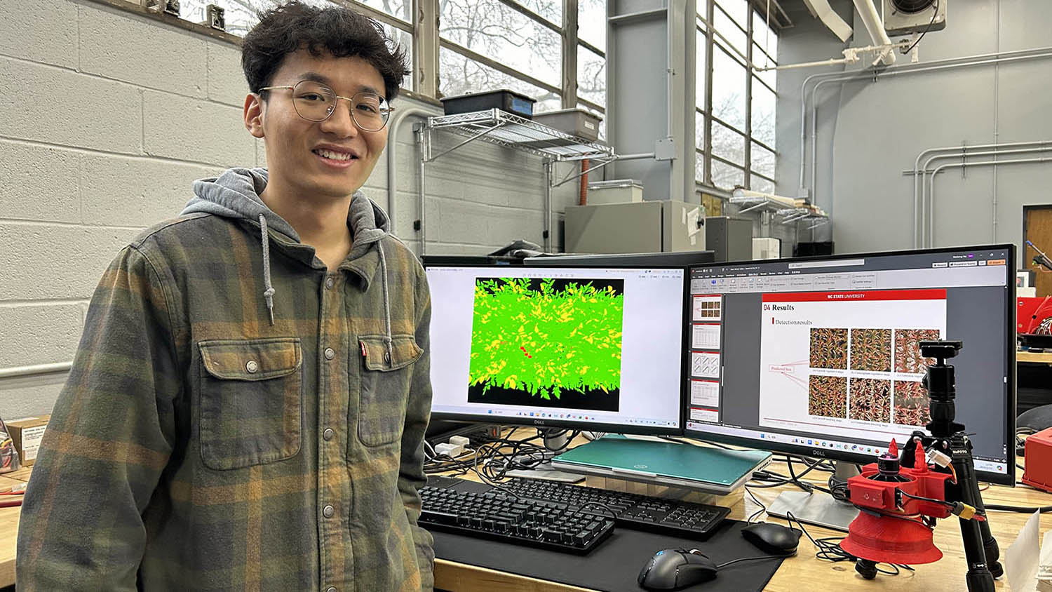 Weilong He in the Suggs Laboratory in the Department of Biological and Agricultural Engineering.