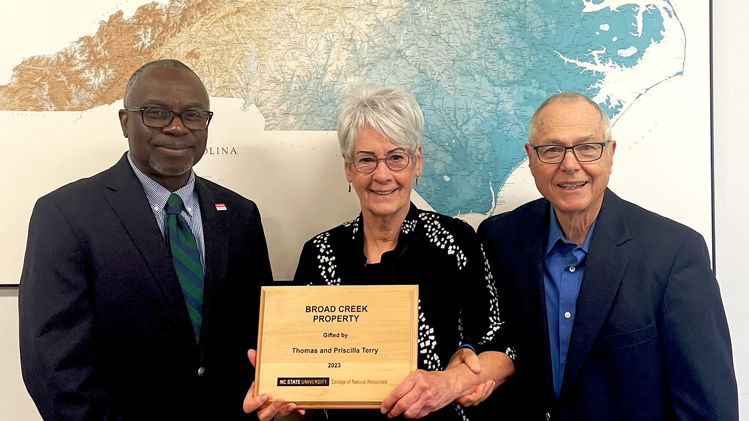 Tom and Priscilla Terry (right and center) with Dean Myron Floyd of the NC State College of Natural Resources.