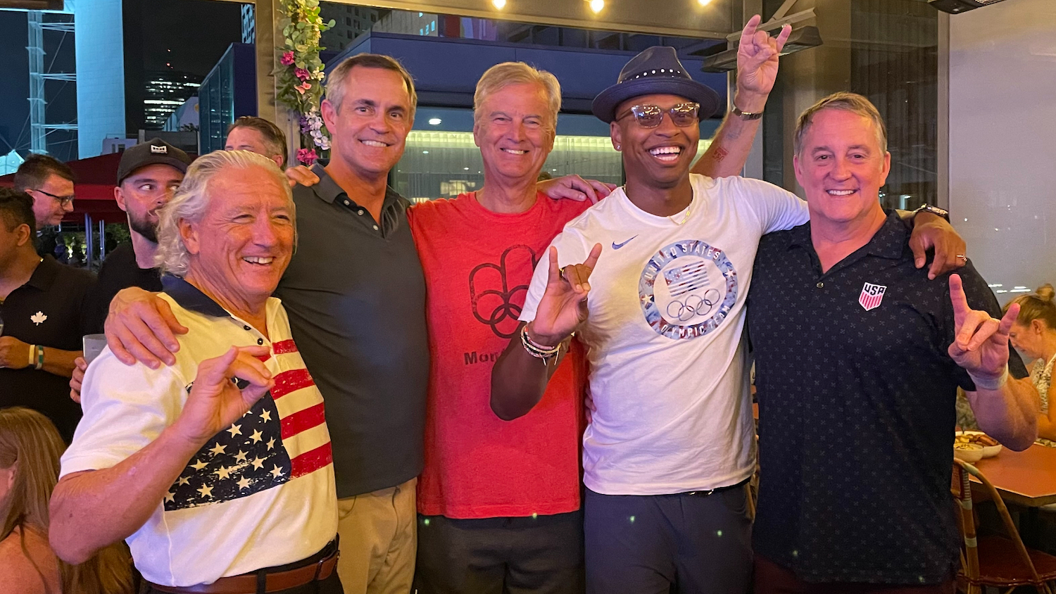 Grant Johnston (far right) with fellow swimming alumni at the 2024 Paris Olympics. Left to right: Sid Cassidy, former professional marathon swimmer and current chairperson of the FINA Open Water Swimming Technical Committee; David Fox, 1996 Gold Medalist in the 4x100 Freestyle Relay; Dan Harrigan, 1976 Bronze Medalist 200-meter Backstroke; and Cullen Jones, 2008 Gold Medalist 4x100 meter Freestyle Relay, 2012 Gold Medalist 4x100 meter Medley Relay and double Silver Medalist 50 Freestyle, 4x100 Free Relay.