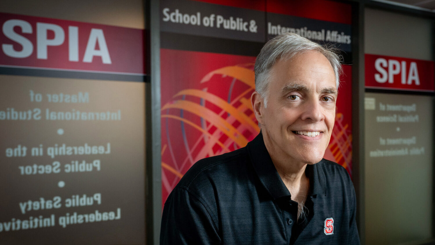 Morris sitting in the SPIA suite in Caldwell Hall.