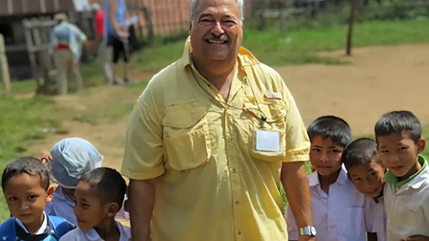 Rick Wicker with a group of children