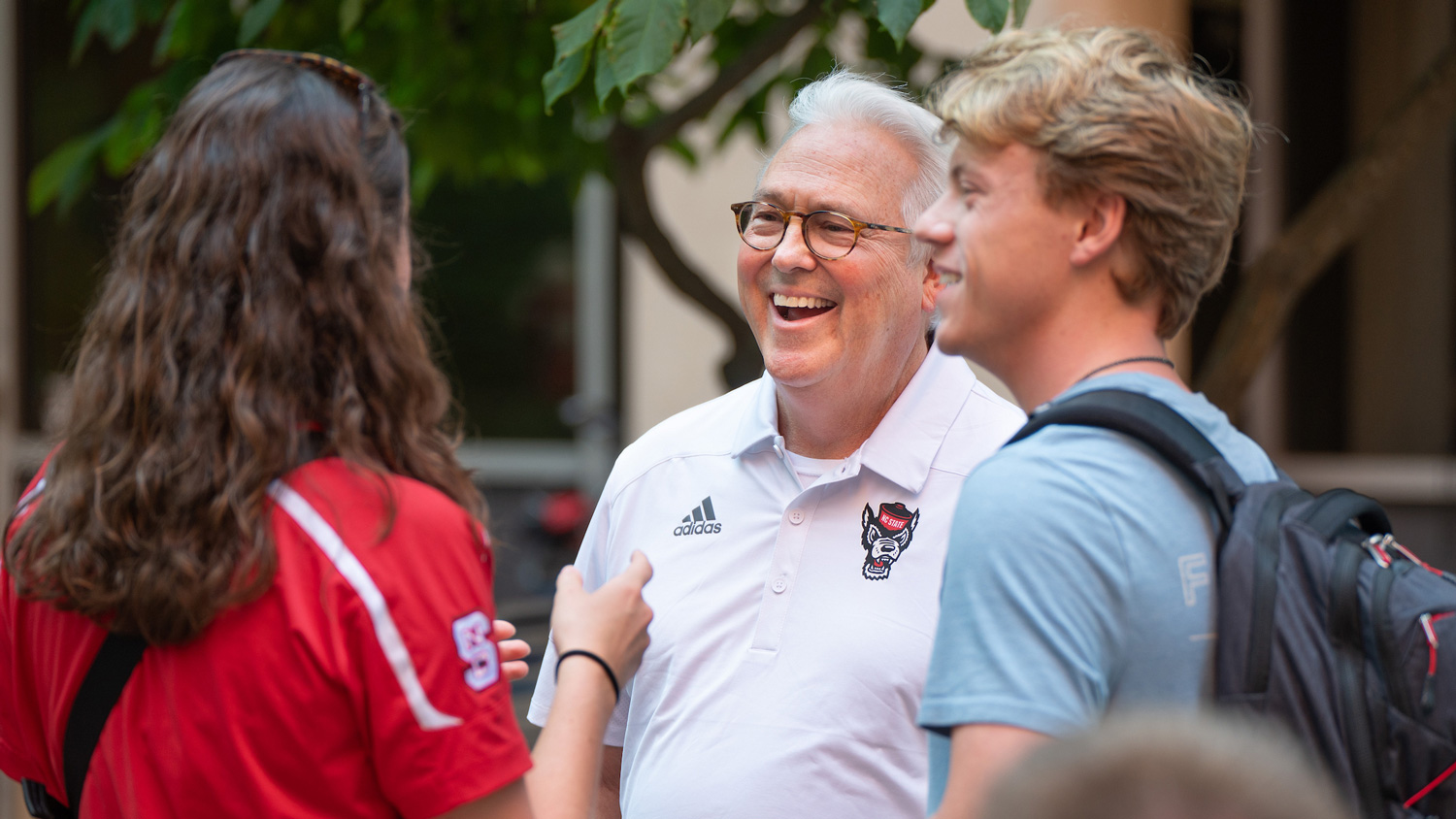 Chancellor Randy Woodson meets with students and families during move in, Fall 2024. Photo by Marc Hall