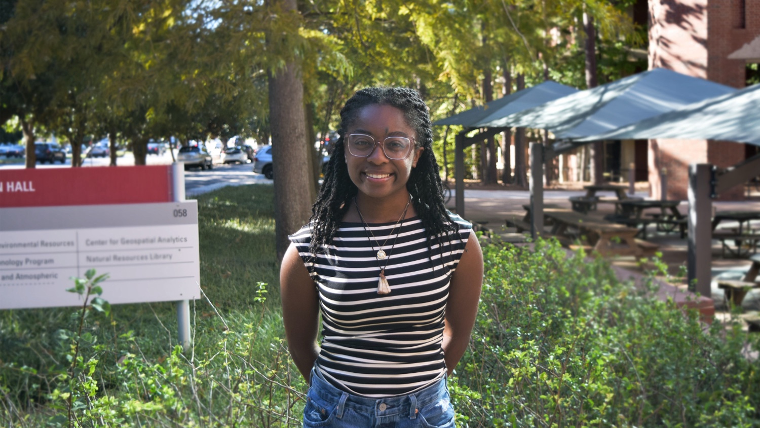 Cadence Davis posing for a photo on campus