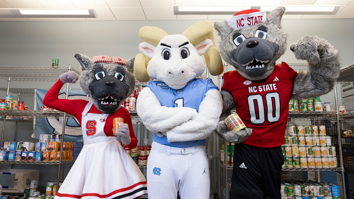 UNC mascot Rameses, center, with Ms. and Mr. Wuf.