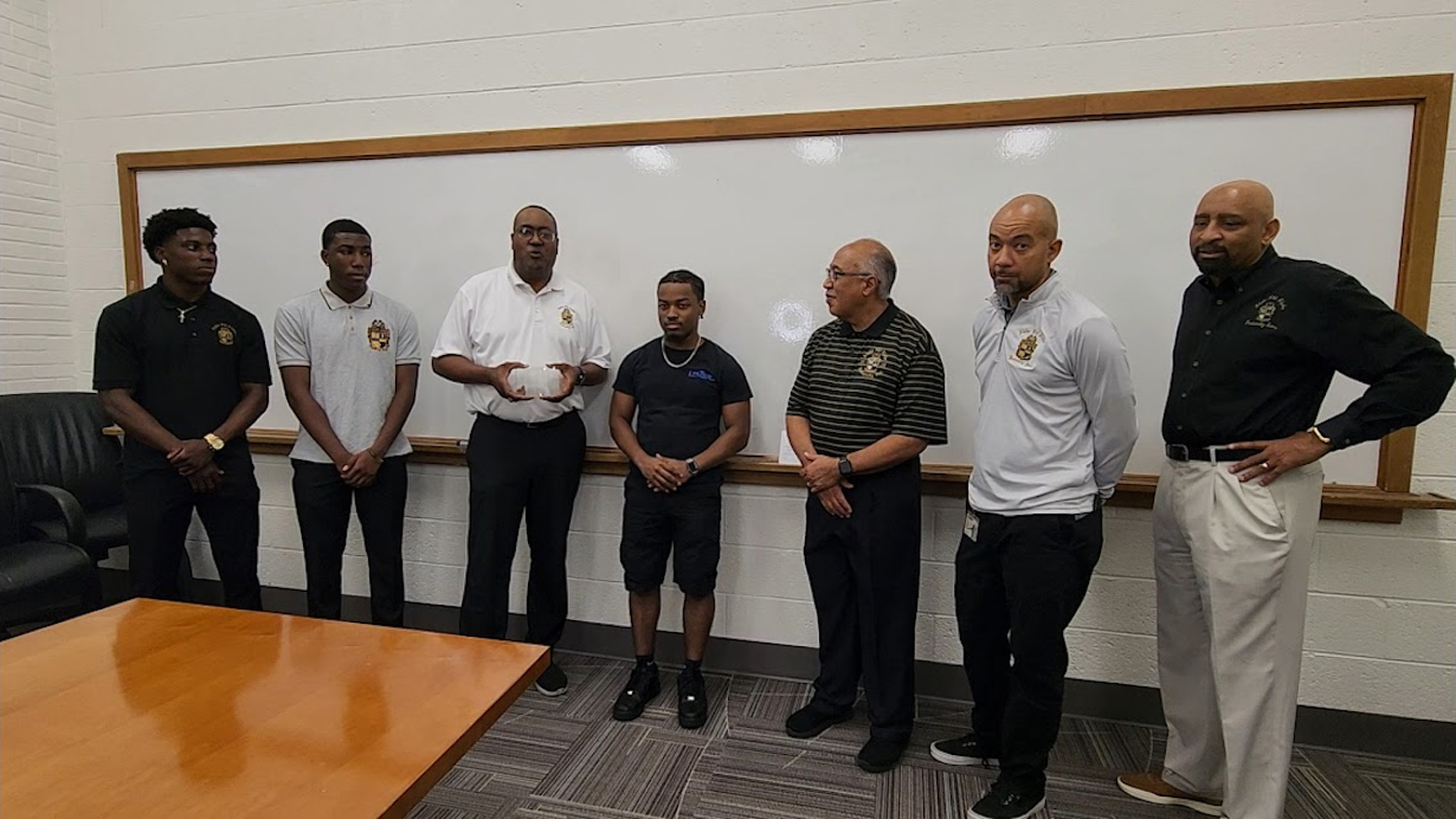 Members of the Alpha Phi Alpha Fraternity, Inc. – Eta Omicron Chapter recognize Samir Flagg (center) as the first recipient of the fraternity’s new Alpha Brotherhood Scholarship. Photo provided.