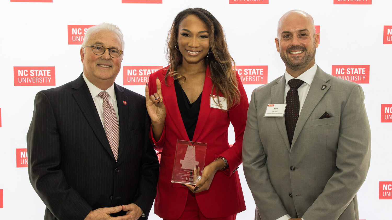 From left: Chancellor Randy Woodson, Arielle Chambers and Ryan de Jong.