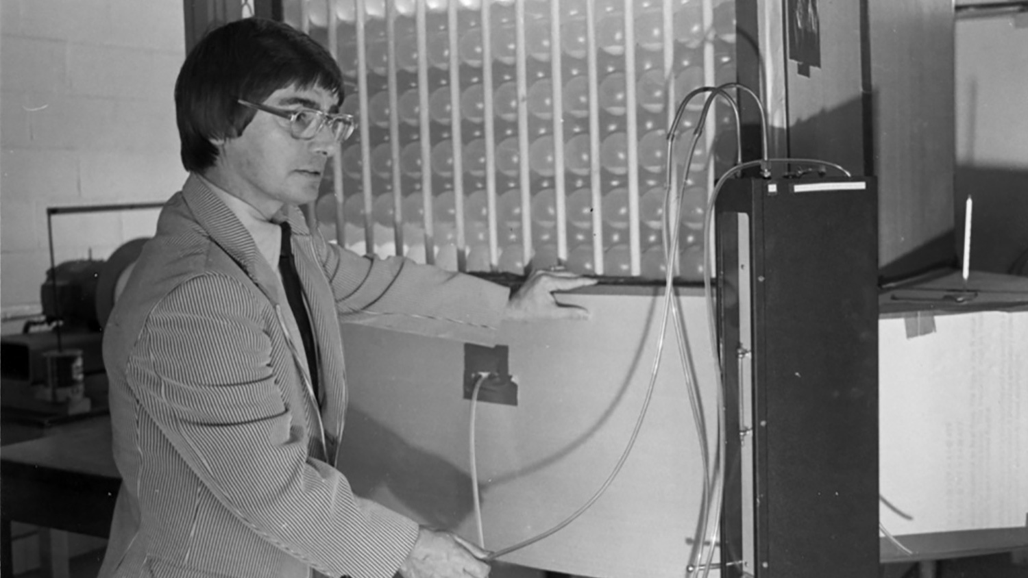 John Bailey working in a lab