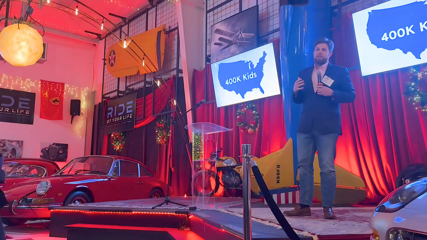 Ryan O'Donnell speaking on stage at an event
