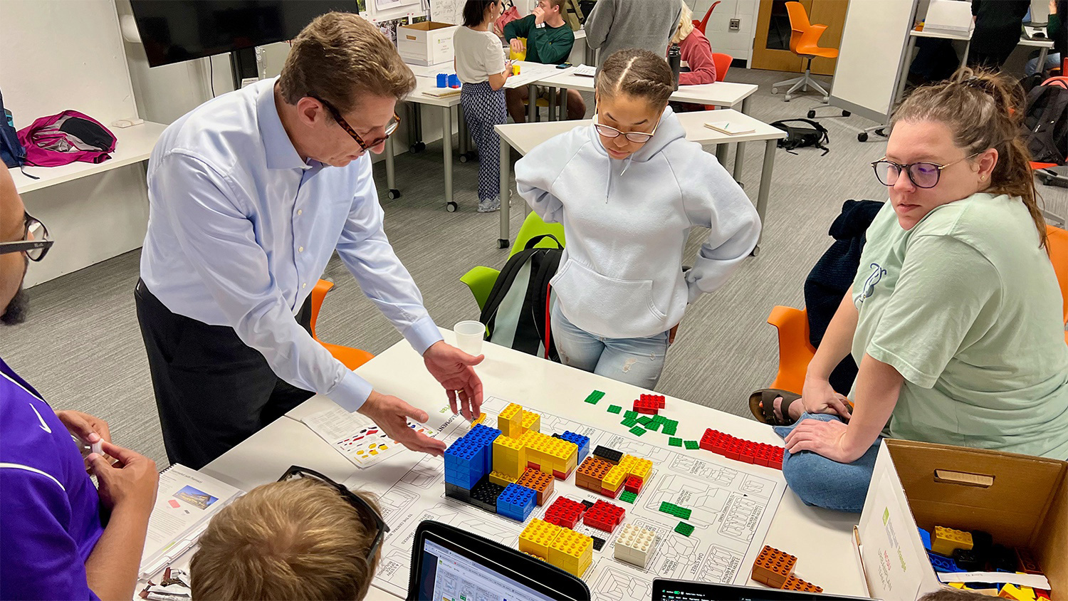 Members of NC State’s Peter A. Pappas Real Estate Development Program use building blocks to explore design concepts