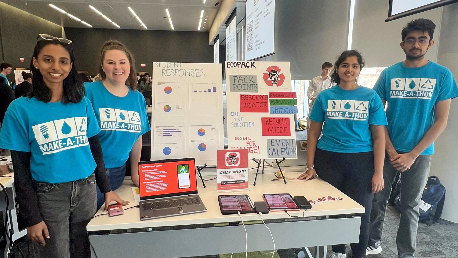 Master of Textiles student Deitra Harnish (second from left) and her teammates show off their sustainable innovation at NC State's Make-a-Thon competition.