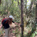 Matthew Francisco ’23 setting up a trail camera as part of his big cat conversation research in the eastern Himalayas.