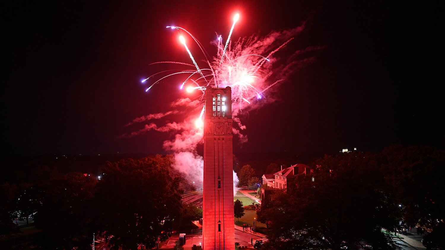 Fireworks behind the Memorial Belltower