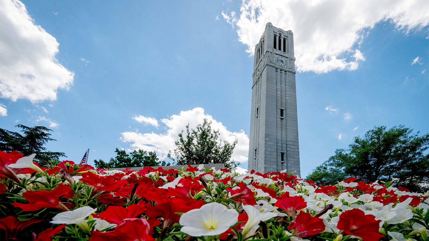 Flowers in front of the Memorial Belltower