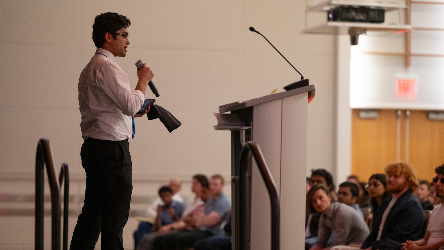 A member of the VenturePack Challenge speaking to an audience.