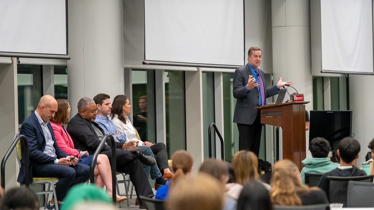 Chuck Flink speaks with a panel of Pappas Real Estate Development program faculty