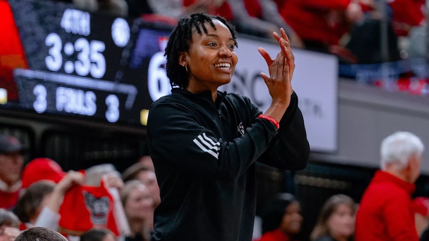 Kayla Jones on the sidelines at a NC State women's basketball game